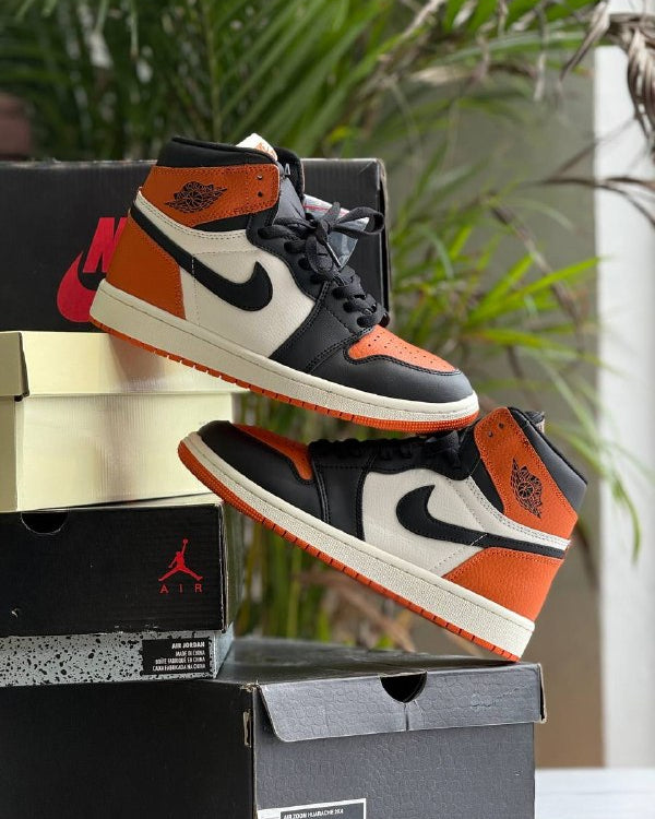 Air Jordan 1 Mid Black Orange