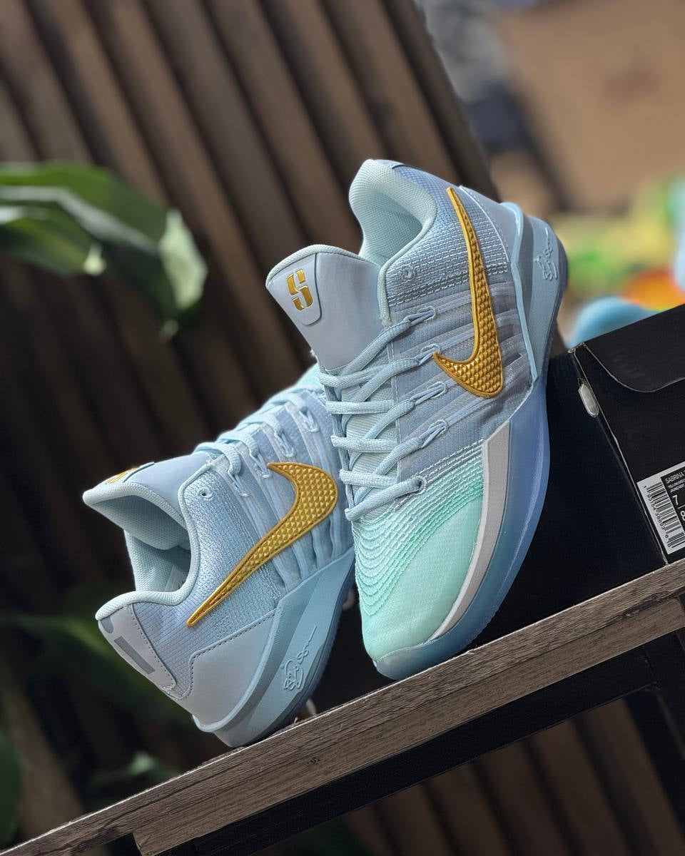 NIKE SABRINA LIGHT BLUE GOLD