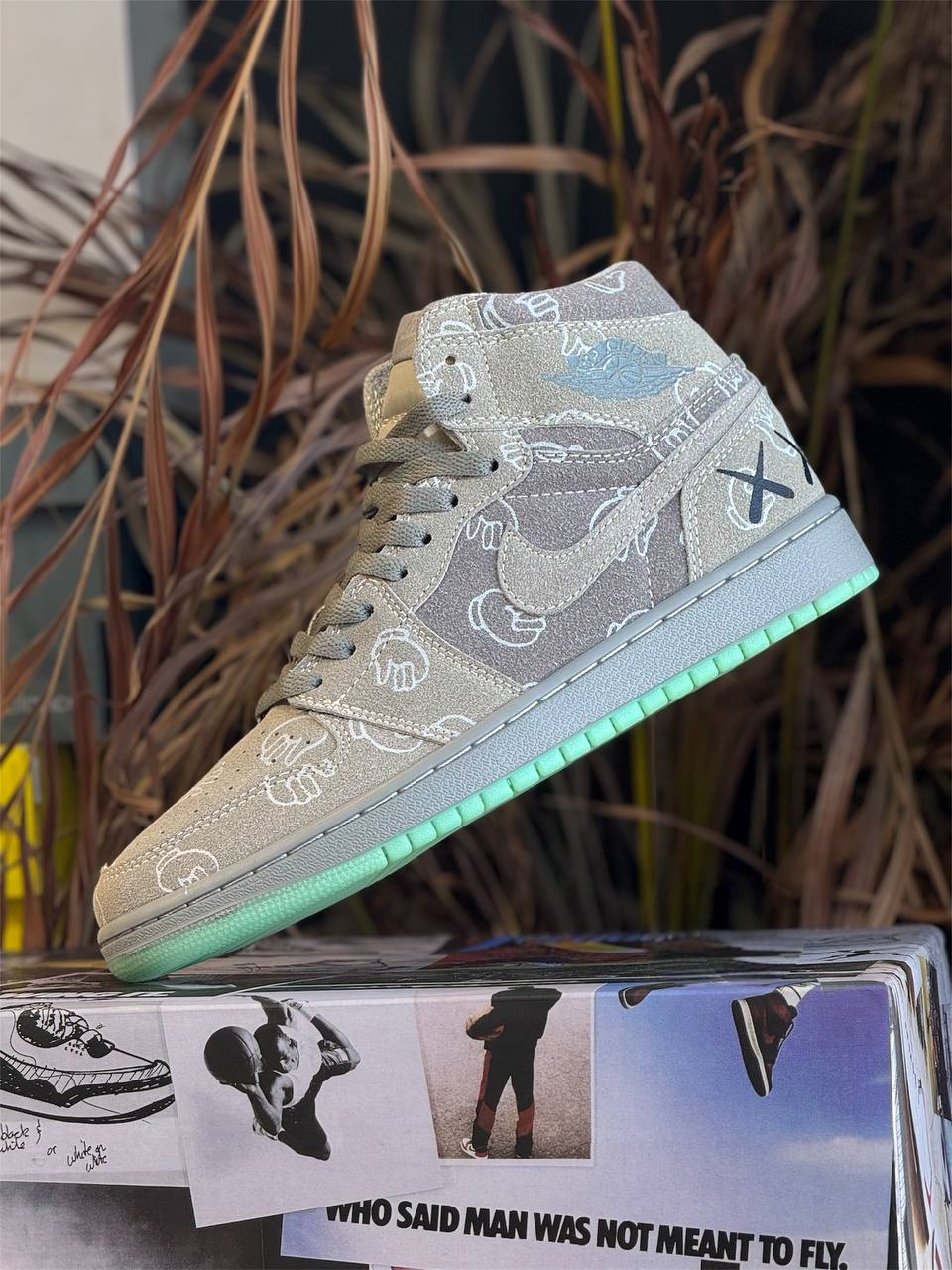 Air Jordan 1 Mid x KAWS “Glow Mint”