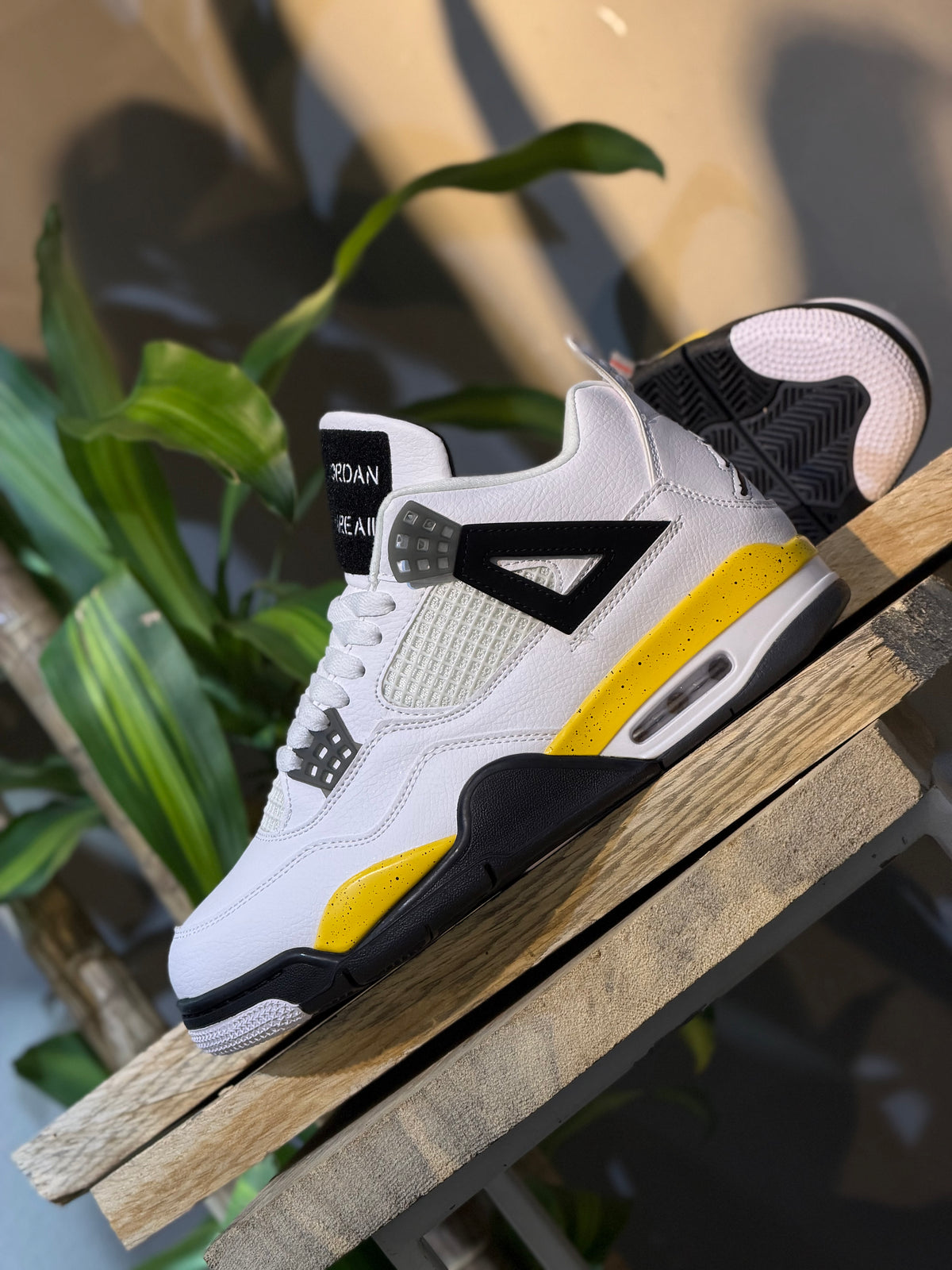 Air Jordan 4 Retro "Tour Yellow"