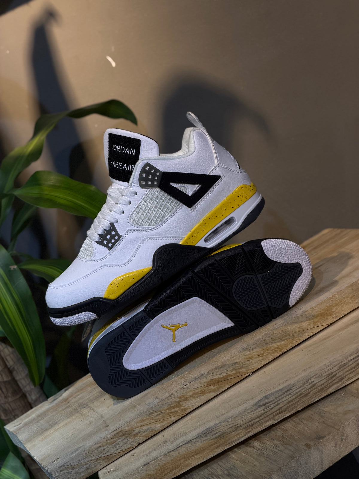 Air Jordan 4 Retro "Tour Yellow"